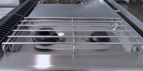 Optional extras include stainless steel pot grids, electric ignition for burners and water bath system with drain kit